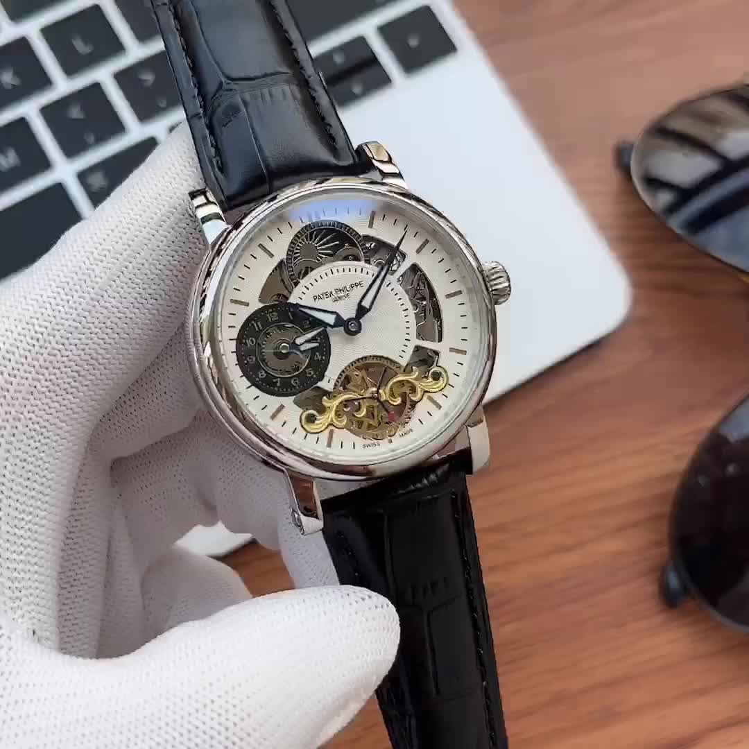 Patek Philippe men’s watch with open-heart movement and black leather strap dia white