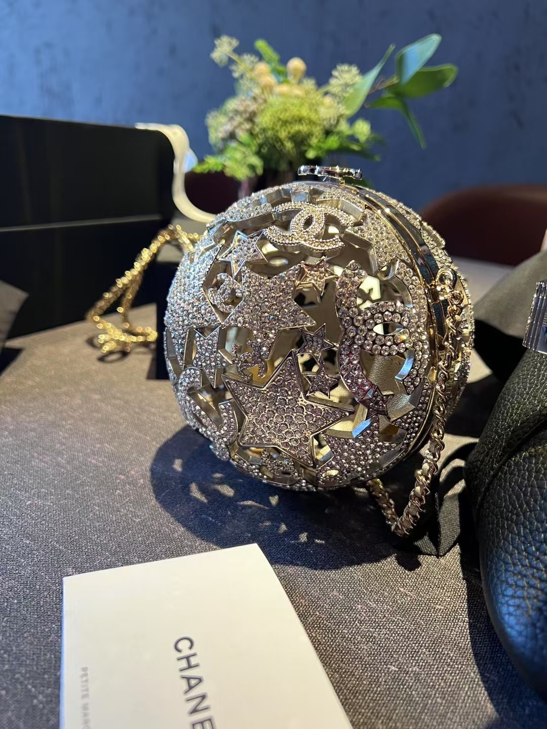Chanel Sphere minaudiere, Gold-tone metal & strass, golden & crystal