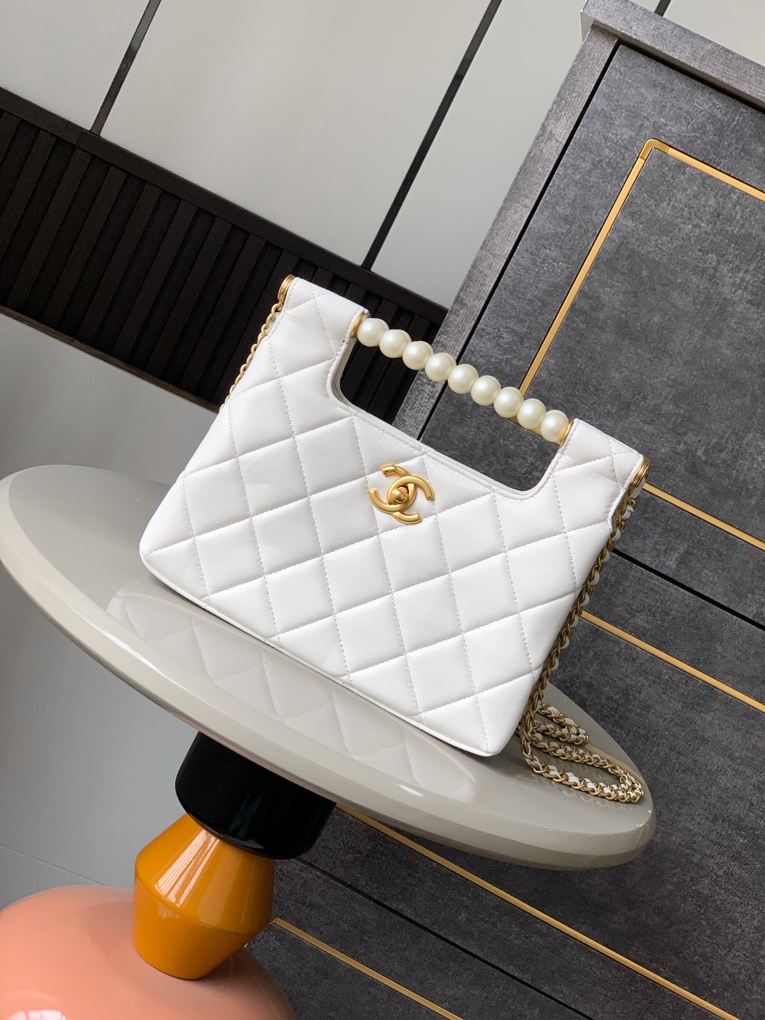 Chanel Flap bag with top handle, Shiny lambskin & gold-tone metal,