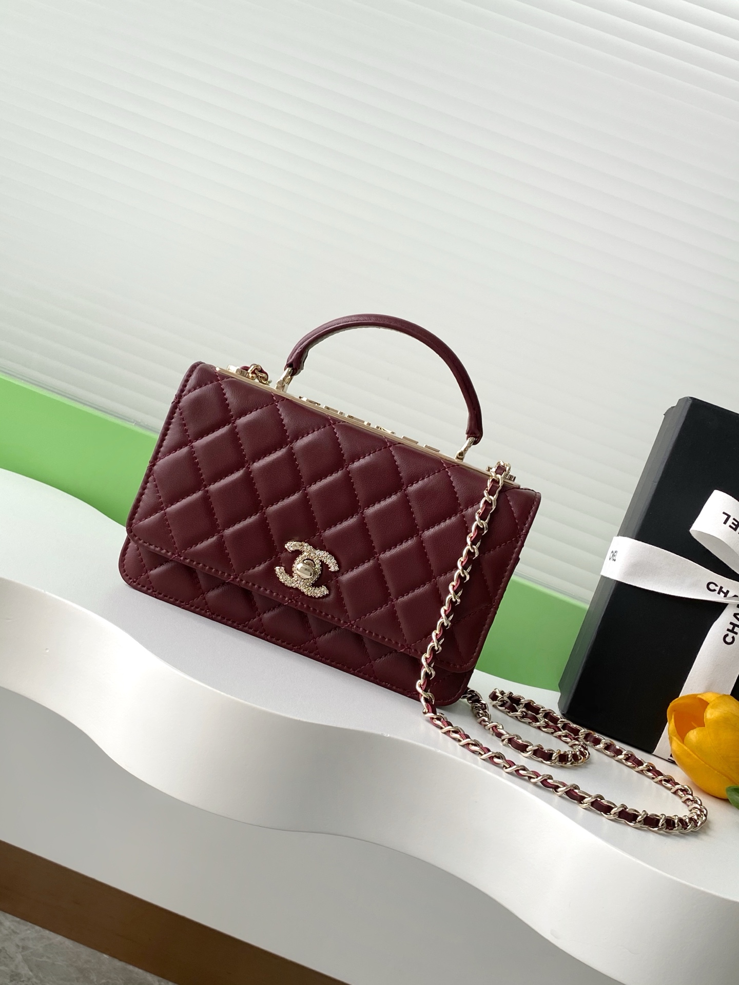 Chanel Clutch with chain – Lambskin, strass & gold-tone metal,