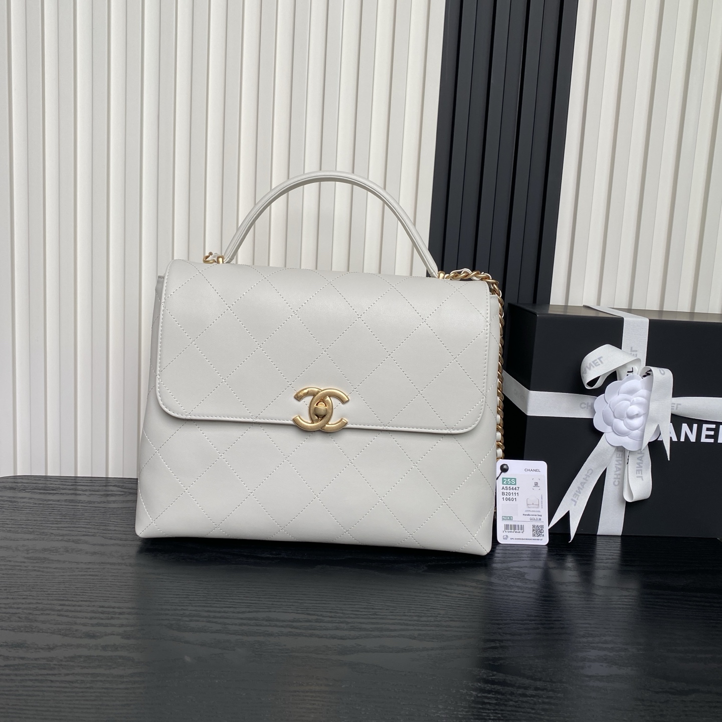 Chanel Maxi flap bag with top handle, Calfskin & gold-tone metal,