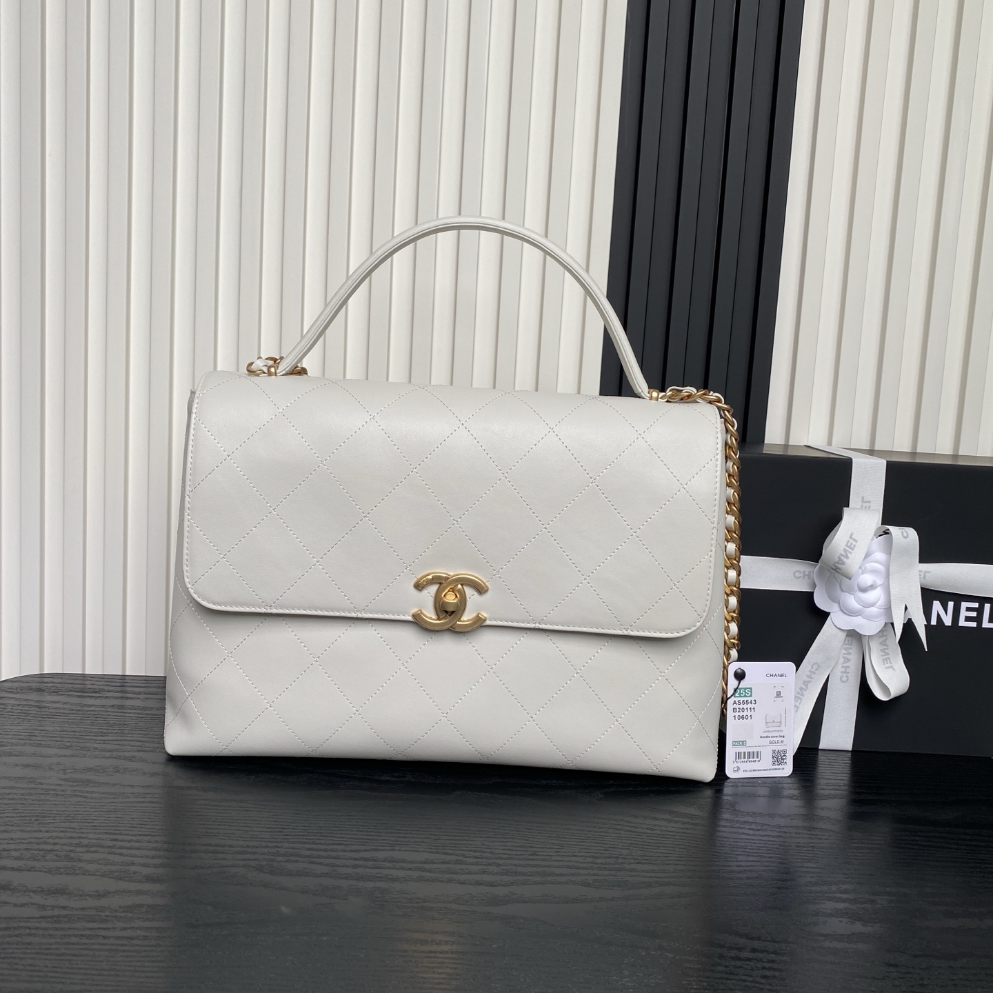 Chanel Maxi flap bag with top handle, Calfskin & gold-tone metal white