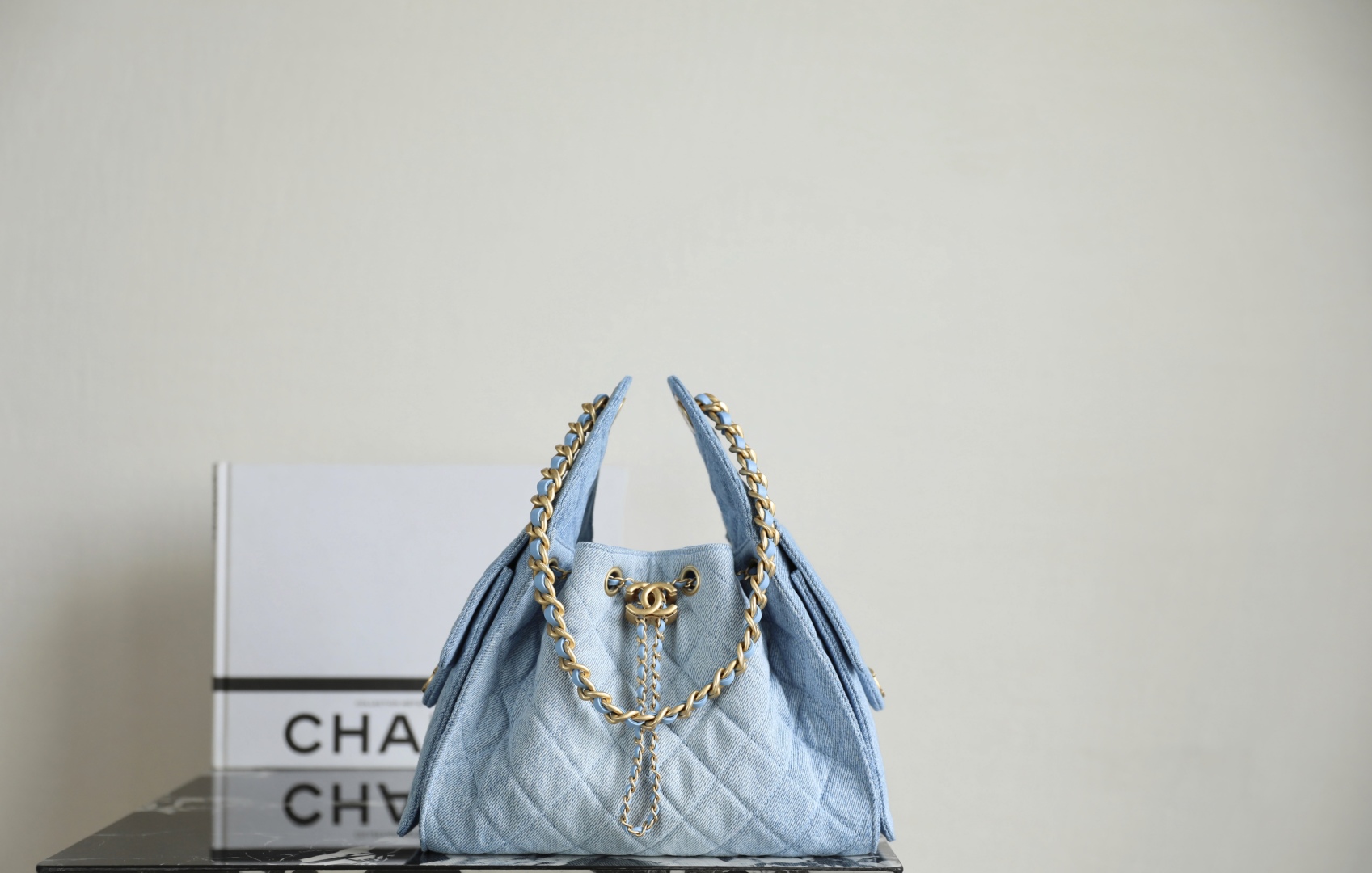 Chanel Chanel 25 small handbag, Washed denim & gold-tone