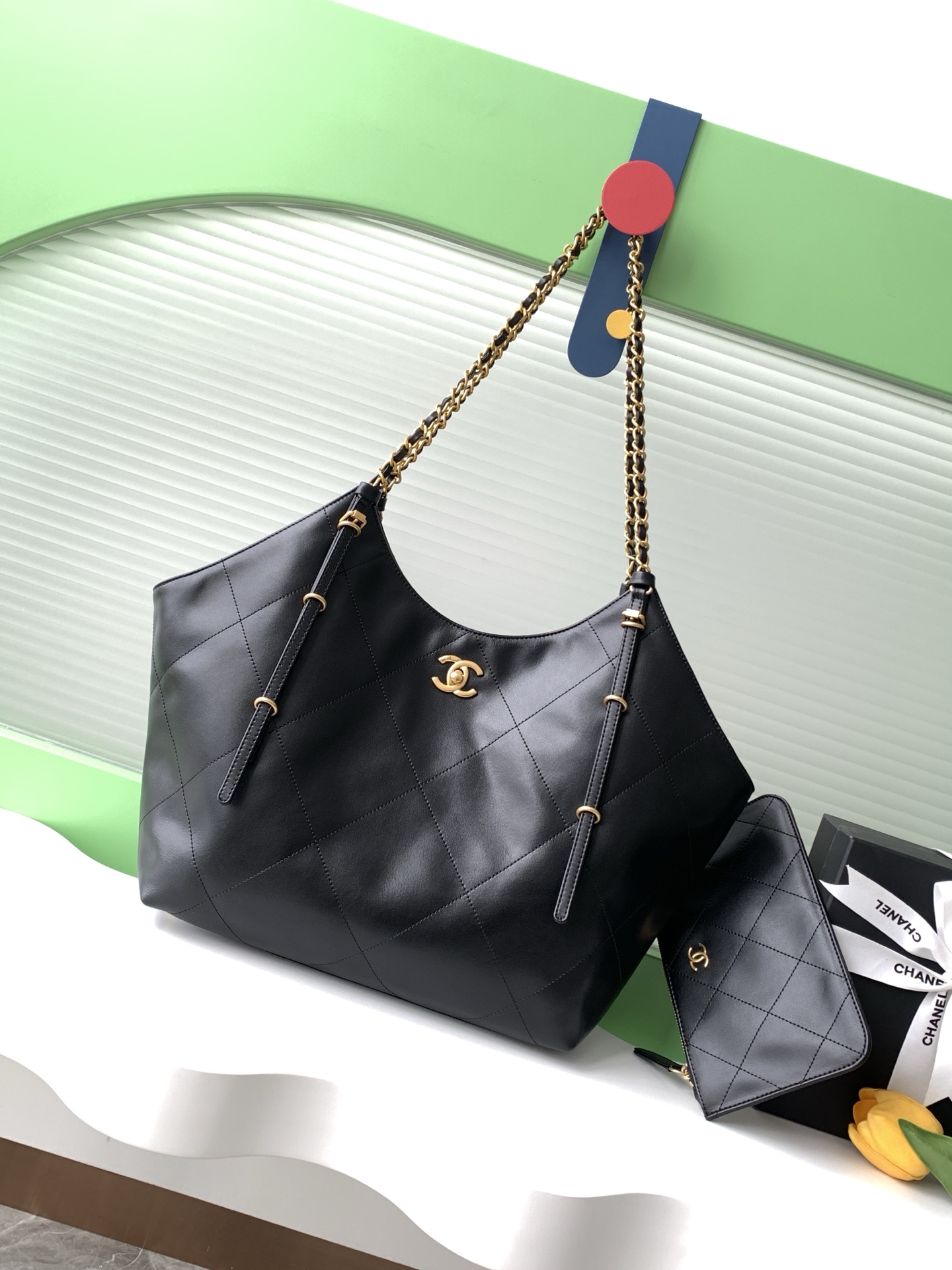 Chanel Maxi shopping bag, Calfskin & gold-tone metal, black