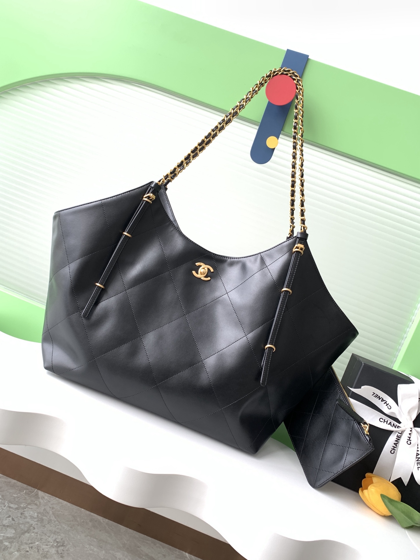 Chanel Maxi shopping bag, Calfskin & gold-tone metal, black