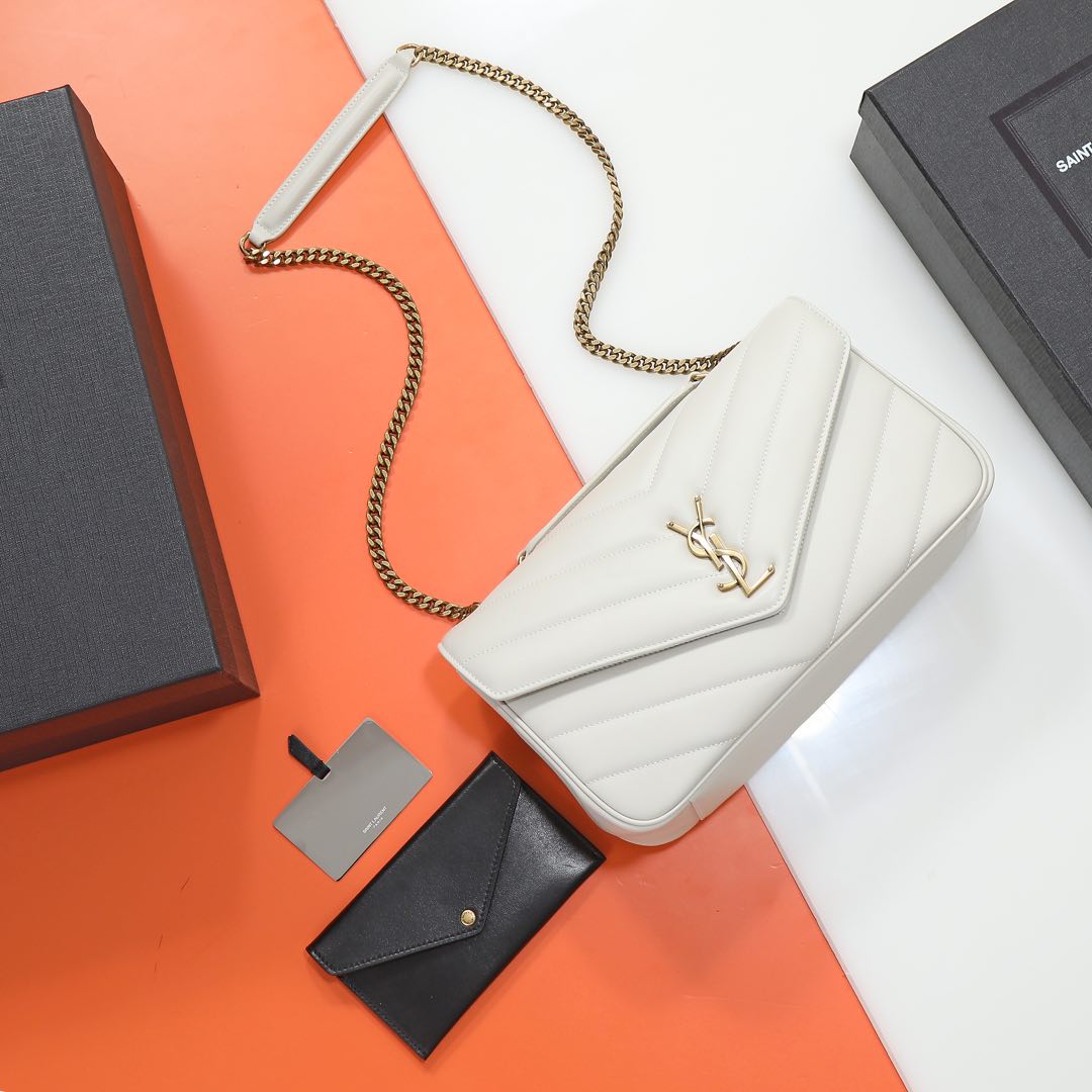 SAINT LAURENT CASSANDRE WOC GRAIN DE POUDRE LEATHER CREMA SOFT – Blank