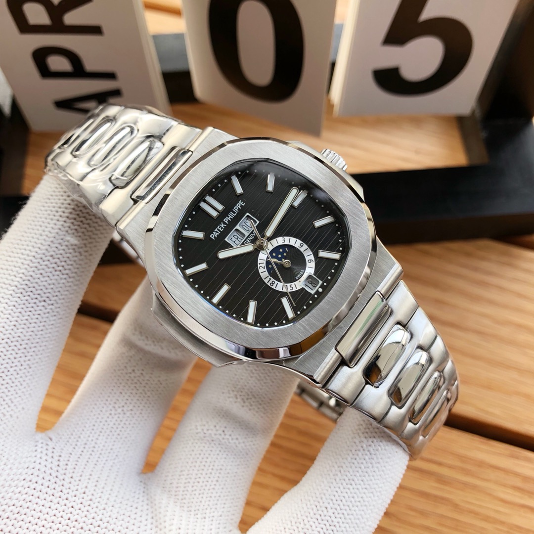 Patek Philippe Nautilus watch black dial silver white strap