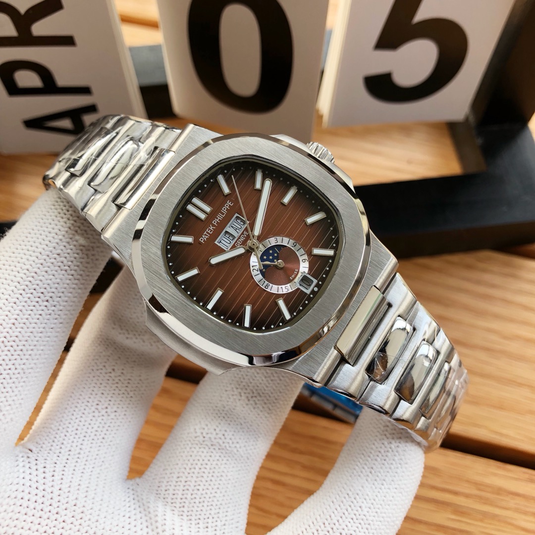 Patek Philippe Nautilus watch brown dial silver white strap