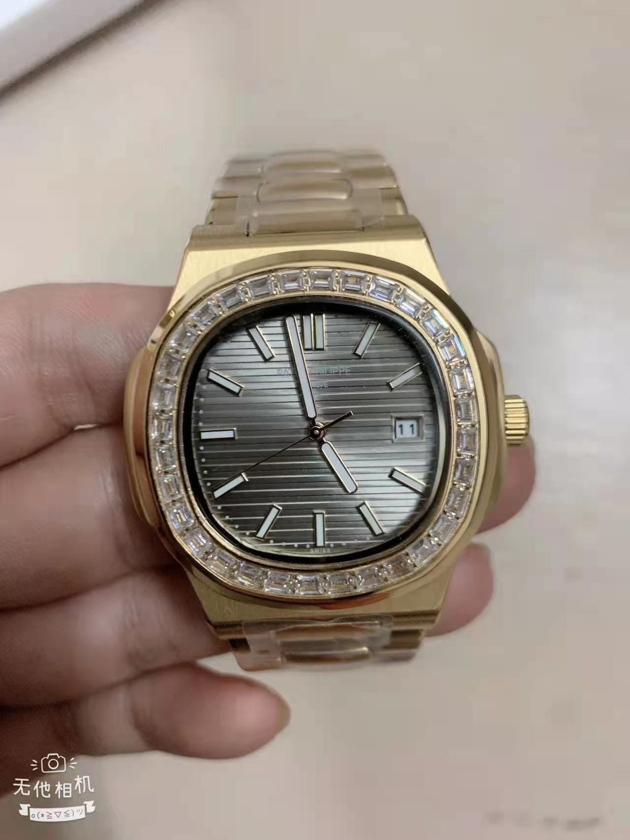 Patek Philippe Nautilus 5723/1R-001 |  gray dial gold strap