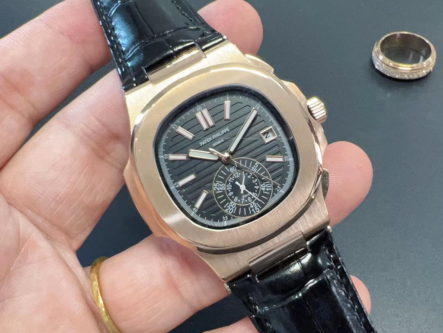 Patek Philippe 5980R-001 Nautilus Self-Winding black leather strap black dial