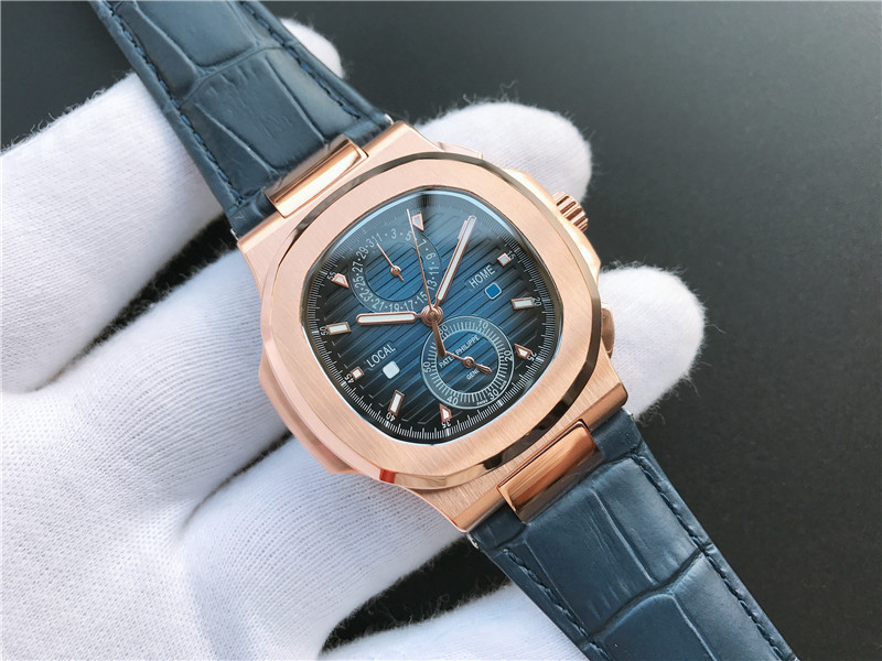 Patek Philippe Nautilus Travel Time Steel Chronograph  gold bezel blue dial blue leather strap