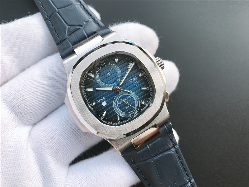 Patek Philippe Nautilus Travel Time Steel Chronograph silver white bezel blue dial blue leather strap