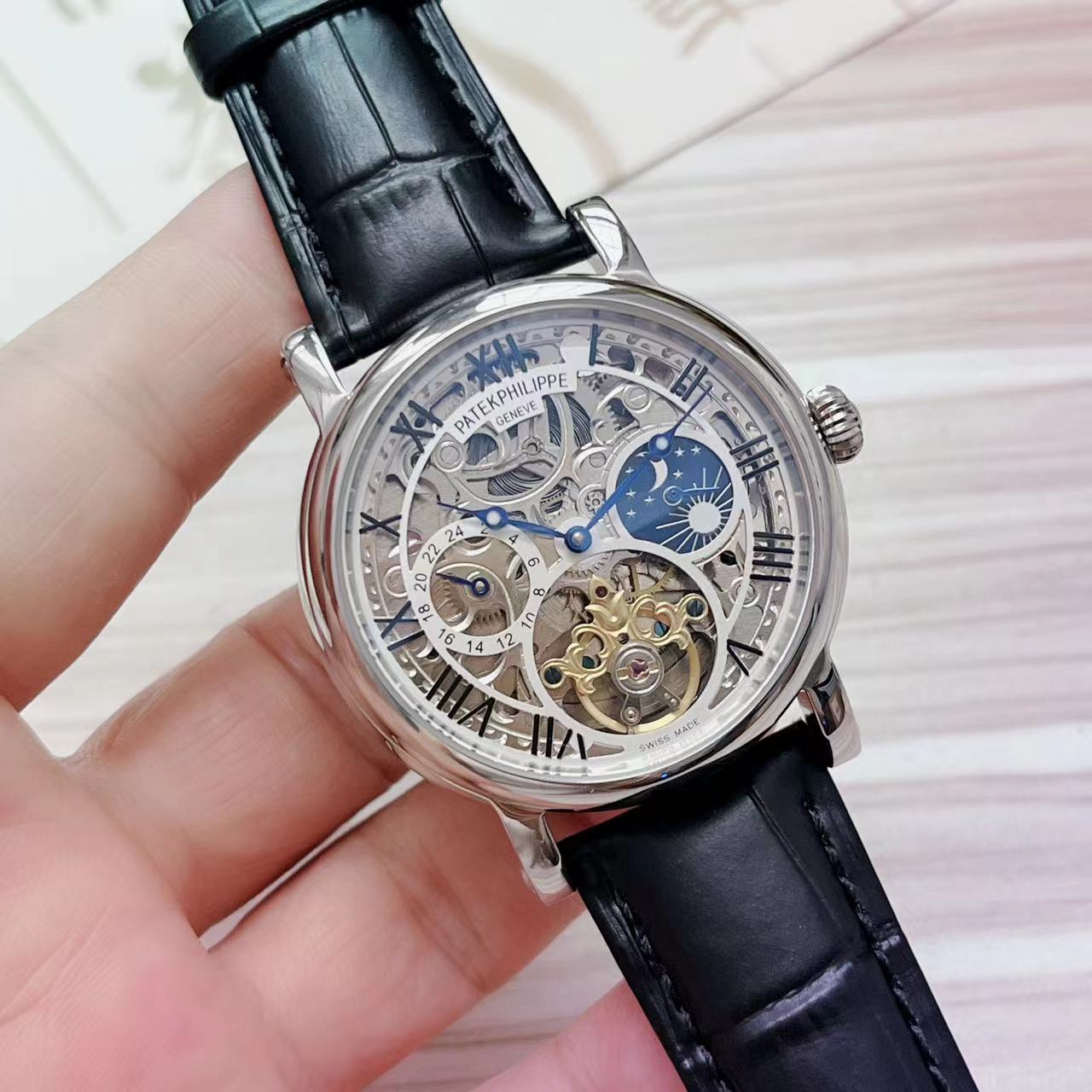 Patek Philippe Skeleton Tourbillon Watch – Rose Gold Case, Moonphase, black leather strap with silver white border