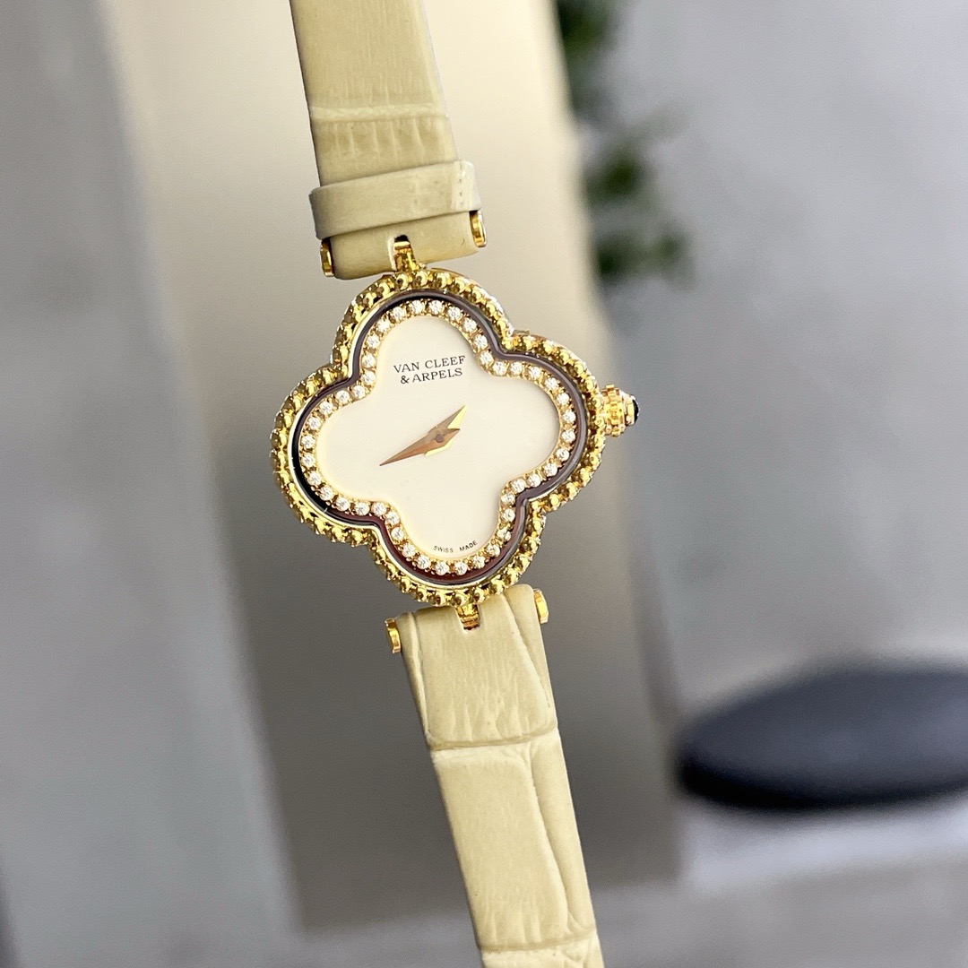 Van Cleef & Arpels Alhambra Small Model Watch with milky white strap, white dial, gold rim