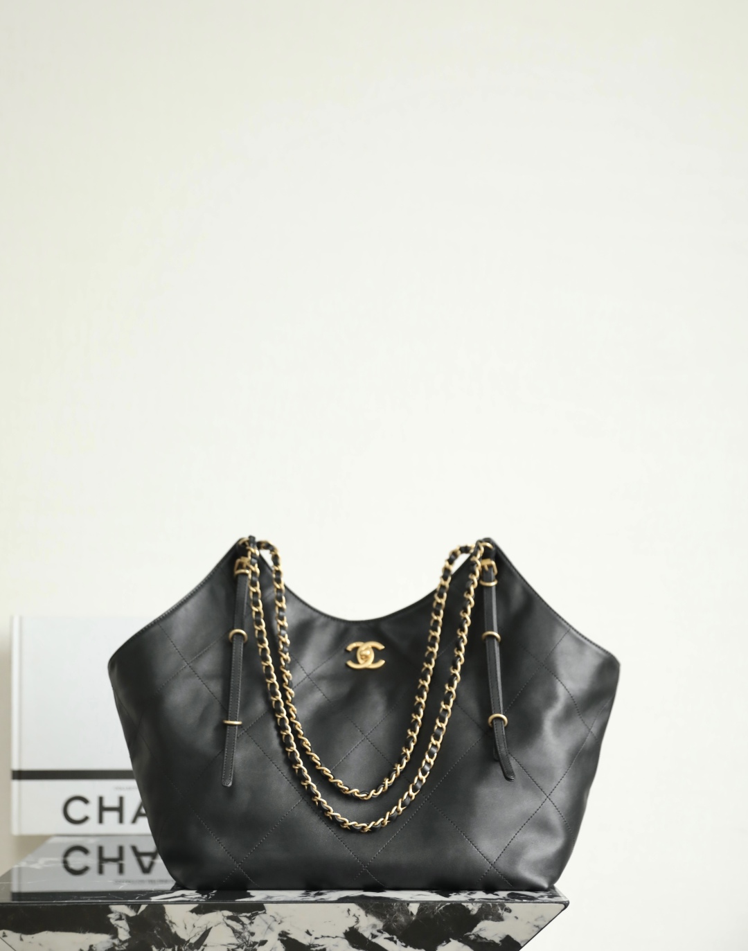 Chanel Maxi shopping bag, Calfskin & gold-tone metal, black